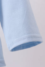 Blue construction embroidery top