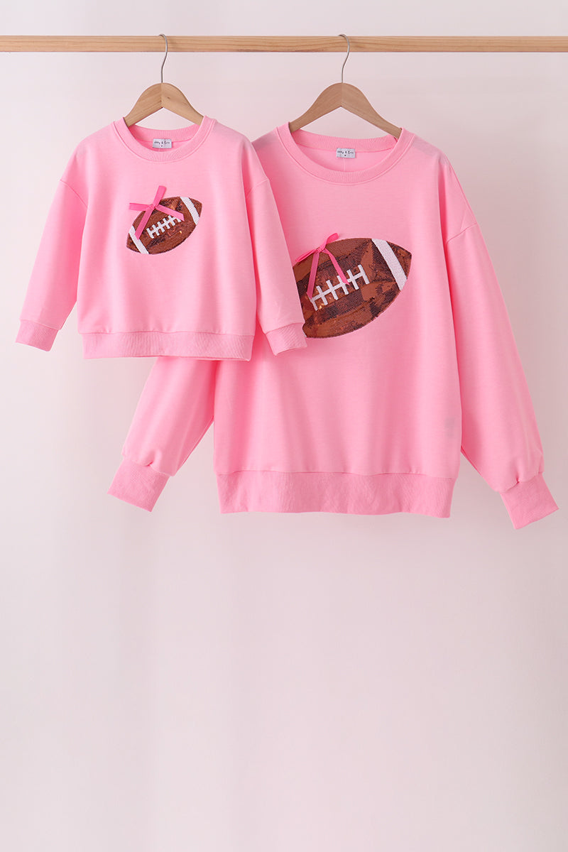 Pink football sequin mom&me top
