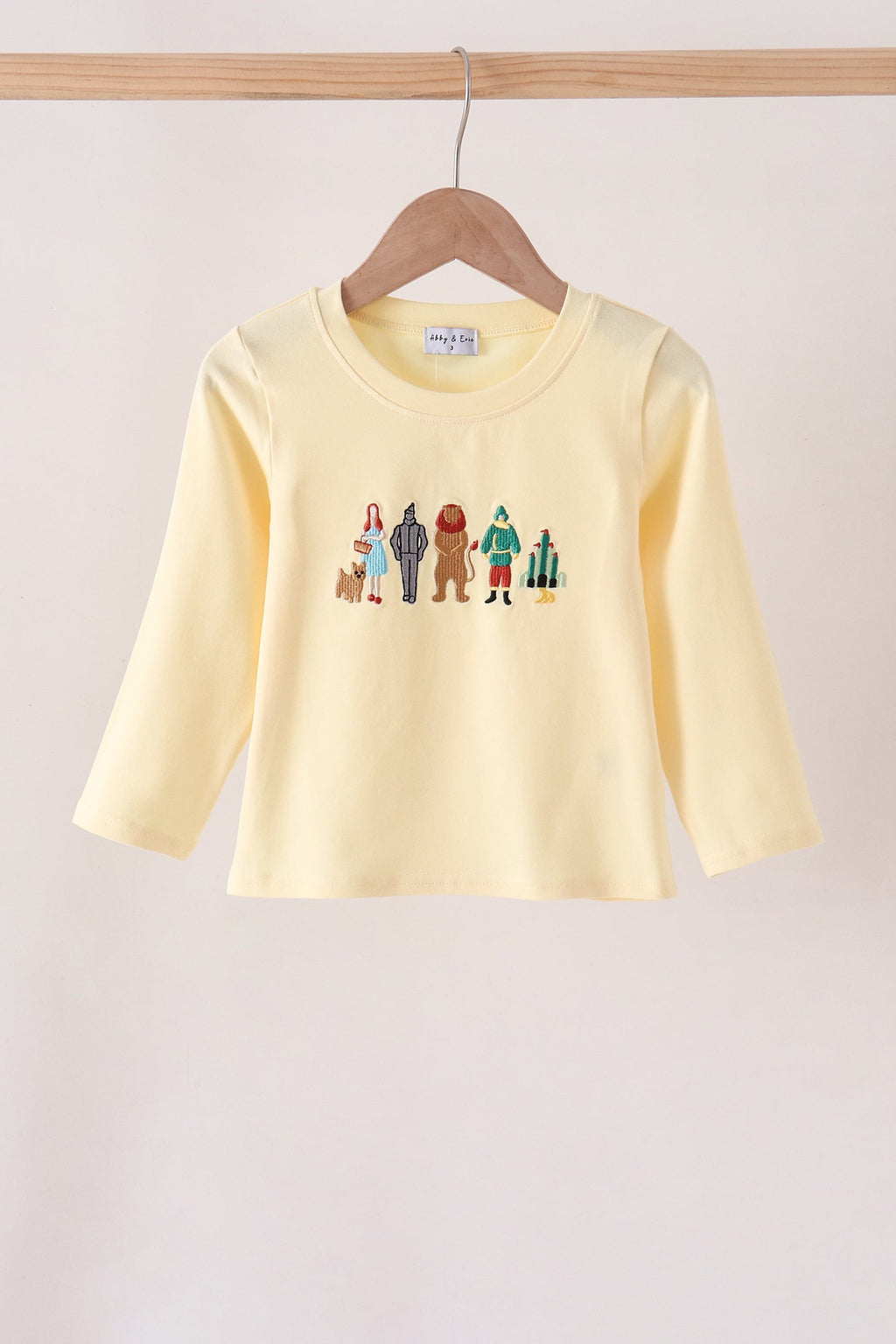 Beige character embroidery top