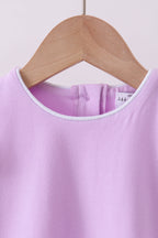 Purple flutter sleeve scalloped top