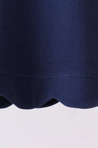 Navy flutter sleeve scalloped top