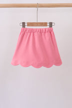 Deep pink scallop hem bow skort