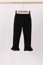 Black ruffle pants