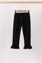 Black ruffle pants