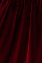 Maroon velvet bow dress