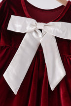 Maroon velvet bow dress