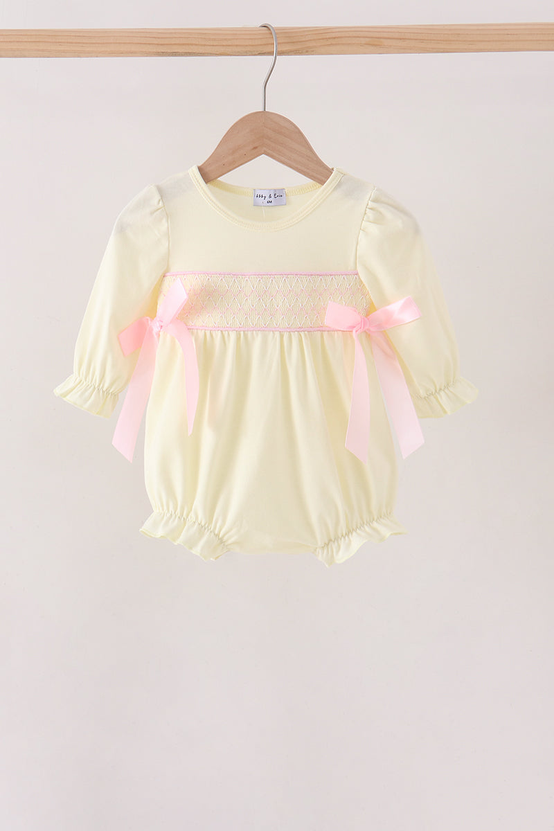 Cream smocked bow bubble