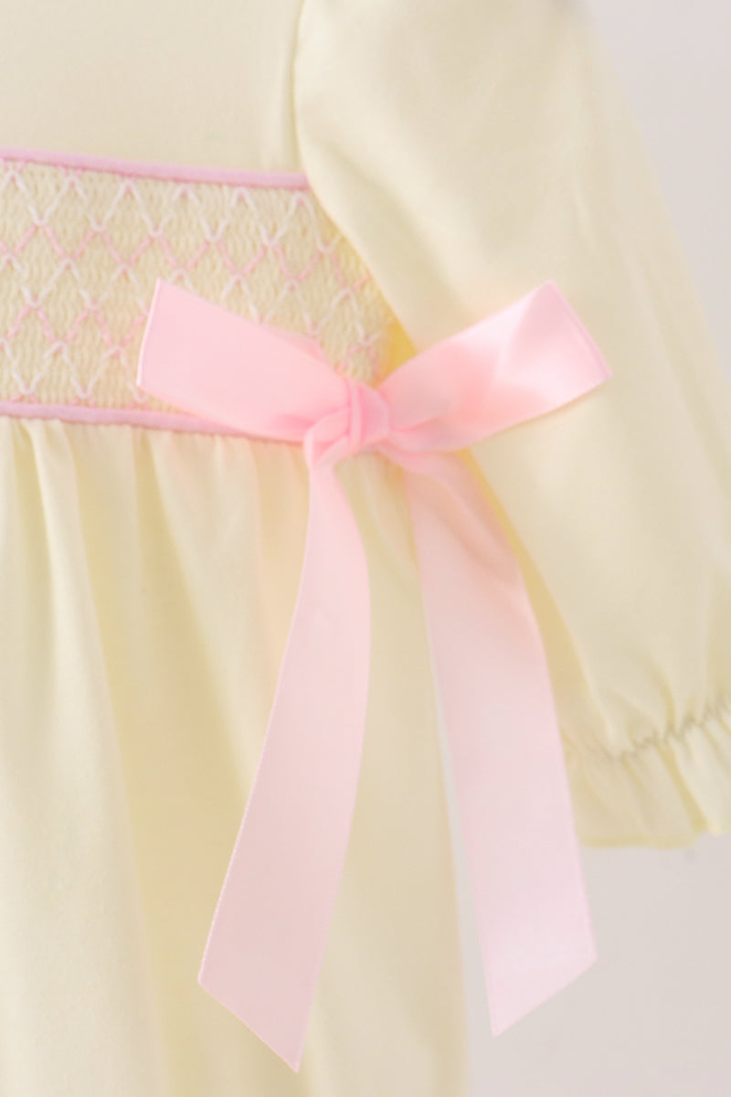 Cream smocked bow bubble
