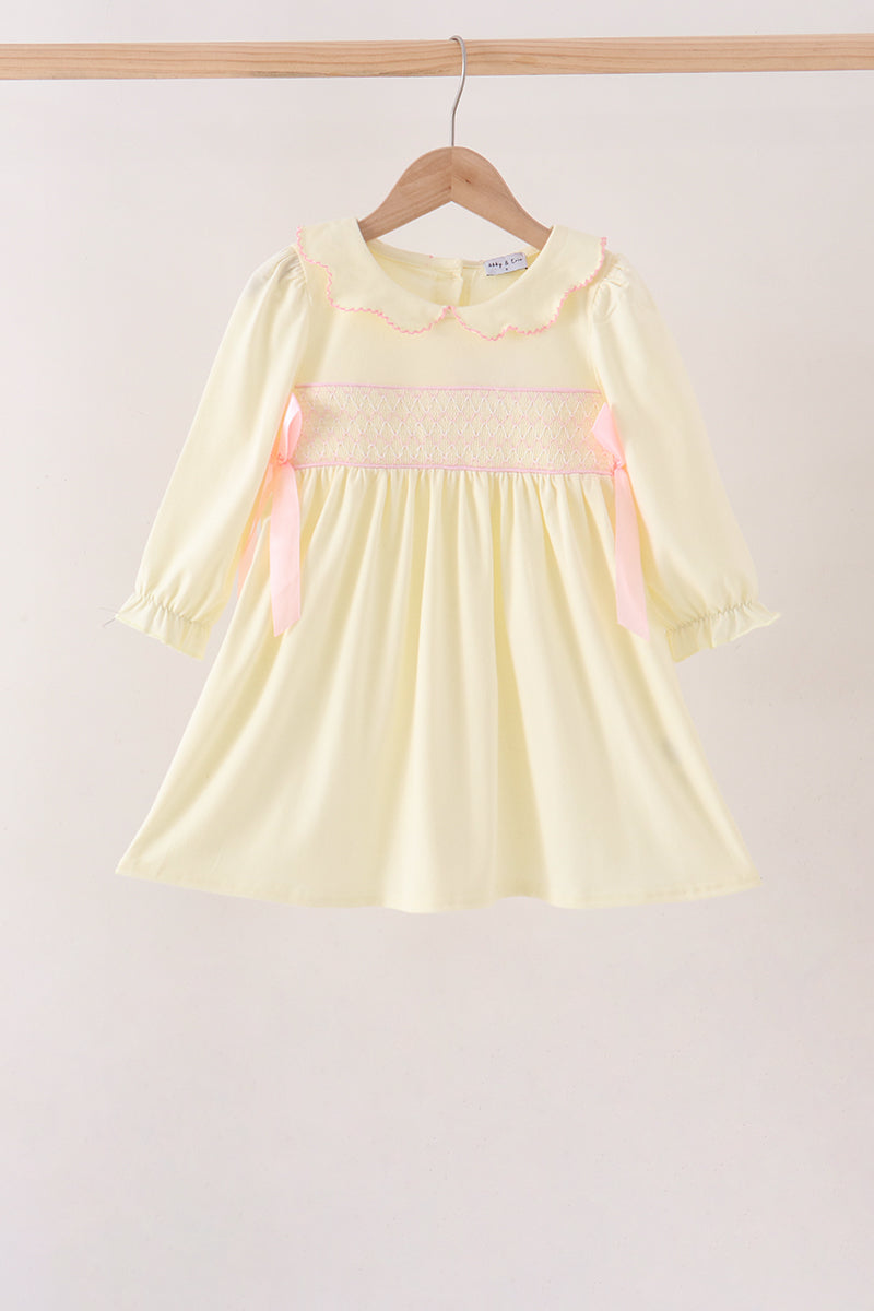 Cream smocked bow dress