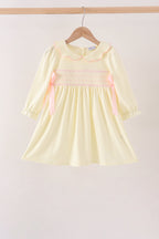 Cream smocked bow dress