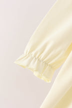 Cream smocked bow dress